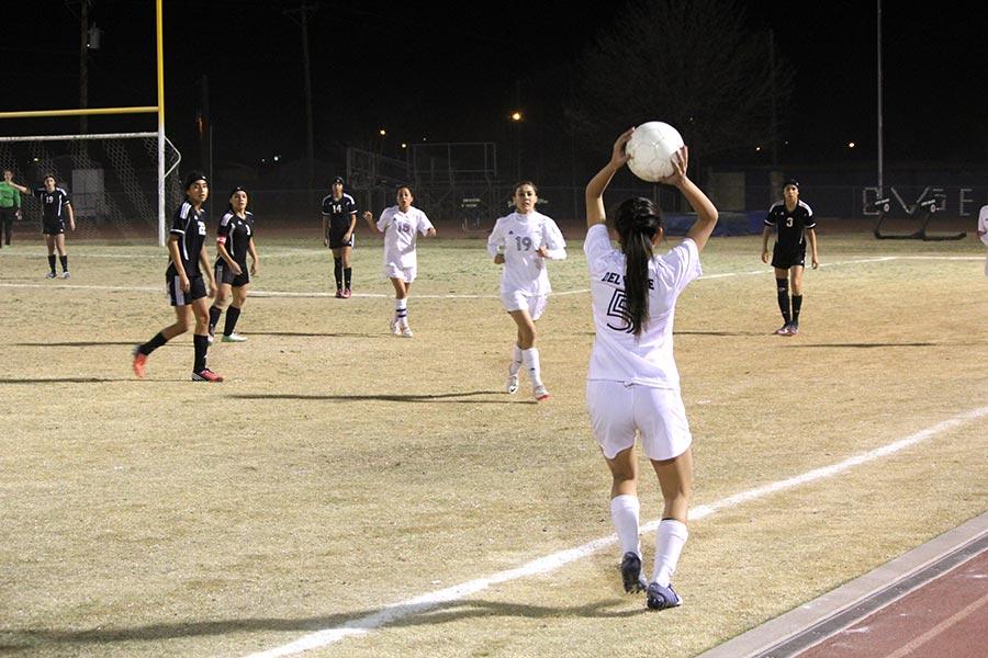 defender, Miranda,  throwing the ball to offense.