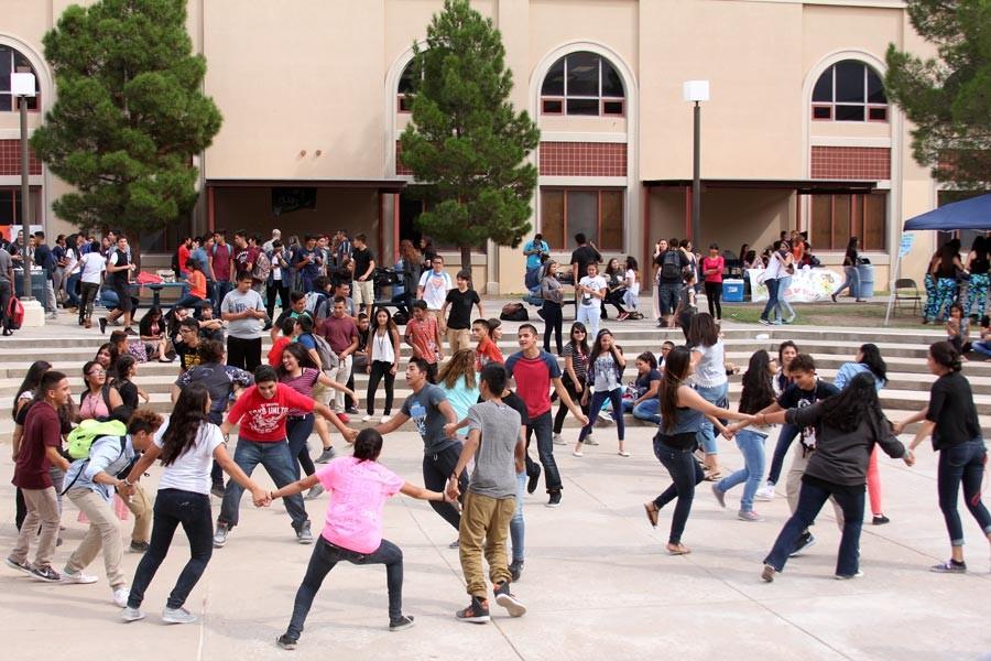 Students dance along to the music. 