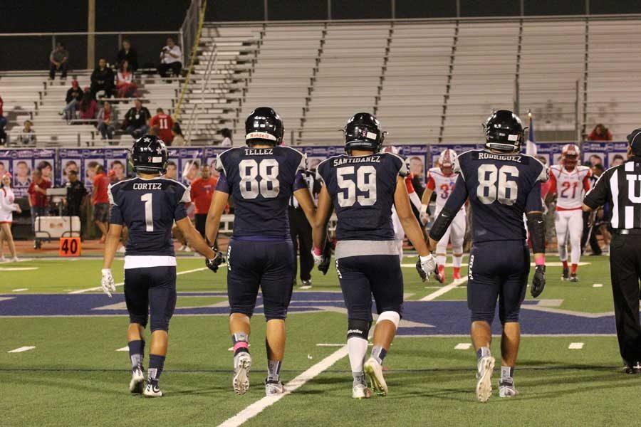 Senior Captains Kevin, number 1, Matt, number 88, Cristian, number 59, and Jorge, number 86, represent the school one last time at the home game against Bel Air High School.