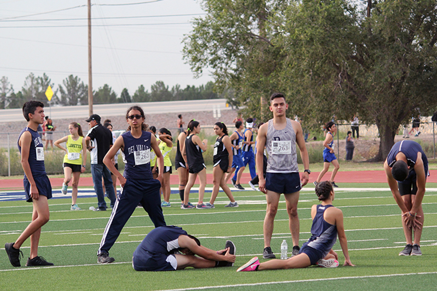 The first cross country meet was hosted Sept. 2, at Conquest Stadium.
Damien, Julian, Irvin and Jazmine are stretching for the race along with fellow runners. 