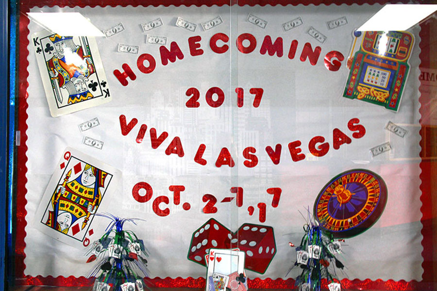 The bulletin board located at the front entrance proclaims the Homecoming theme Viva Las Vegas. 