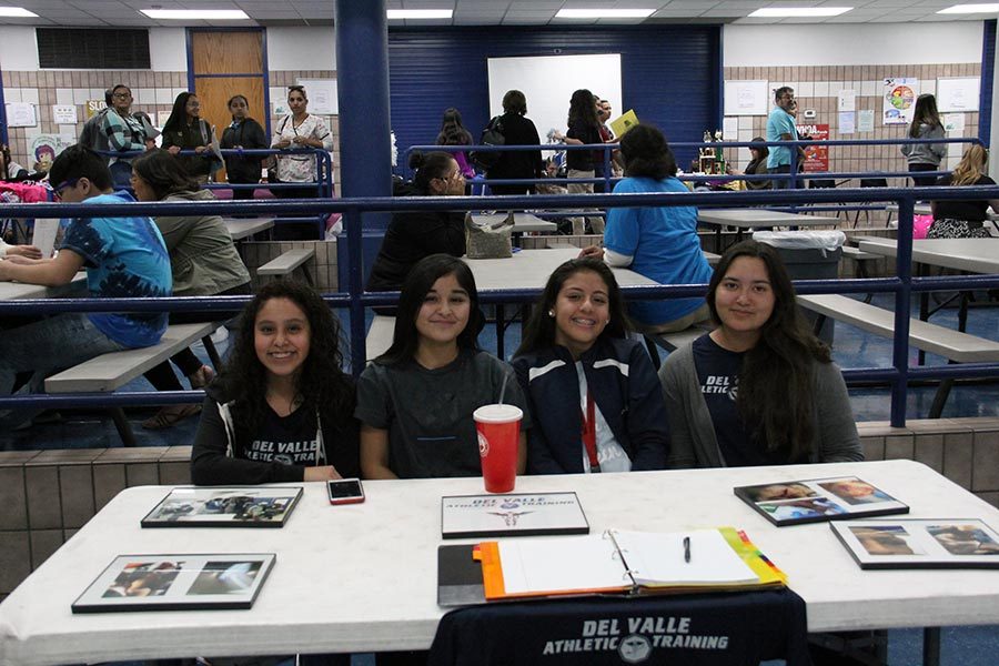 Athletic trainers Leslie, Brianna, Jessica and Bianca inform incoming students about the athletic training program. 