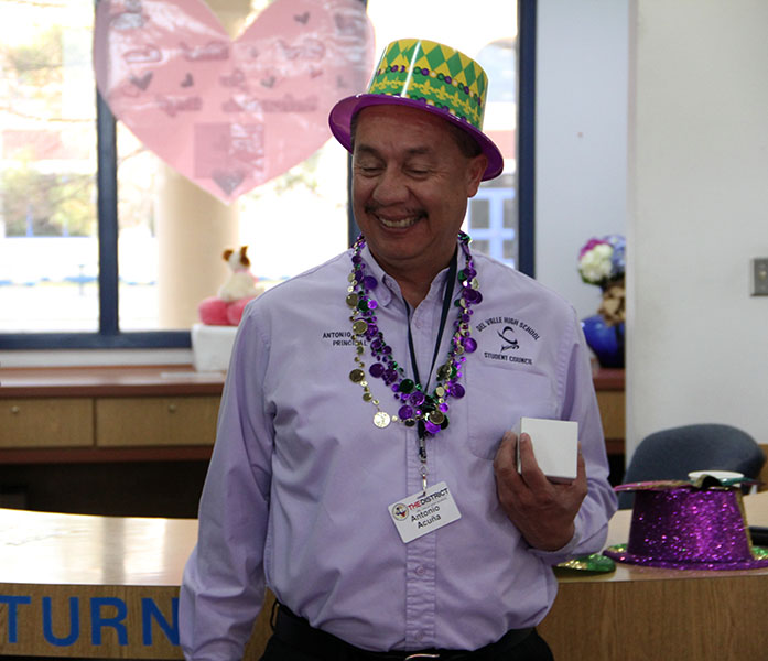 Principal Antonio Acuna at the Liters for Leaders Leadership meeting celebrating Fat Tuesday. 