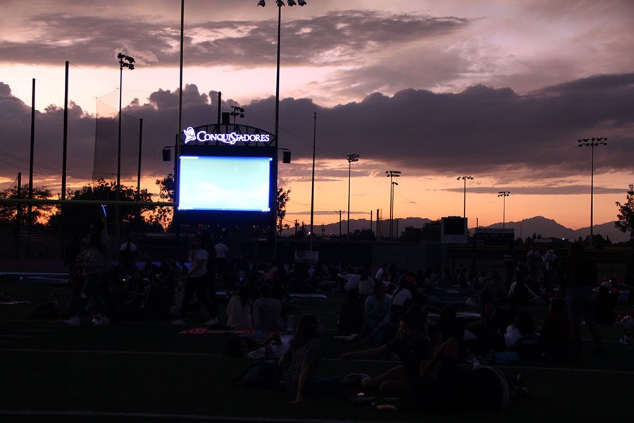 Students wait for The Nightmare Before Christmas to start in Conquest Stadium, Oct. 4.