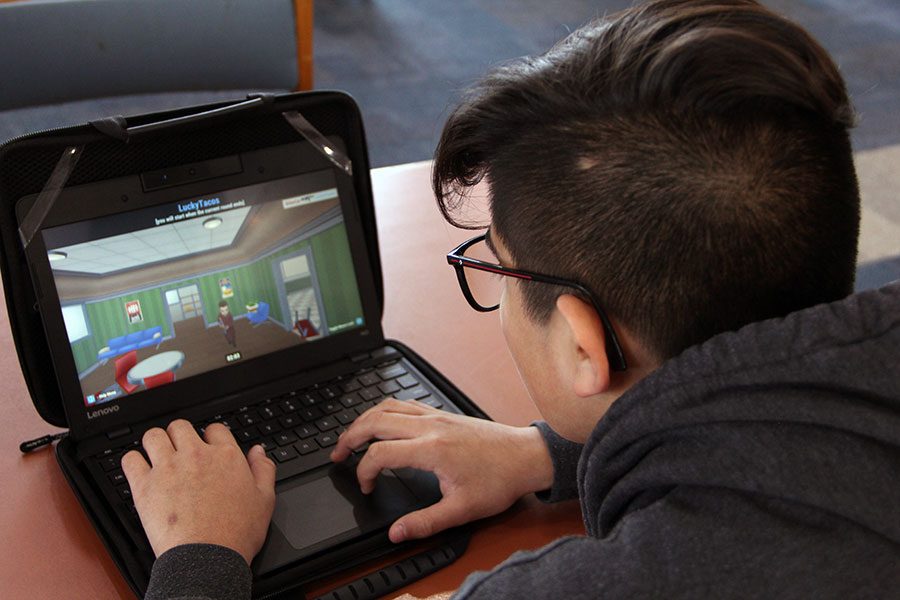 Sophomore Santiago Prendiz uses his Chromebook to play games,  Oct. 2.