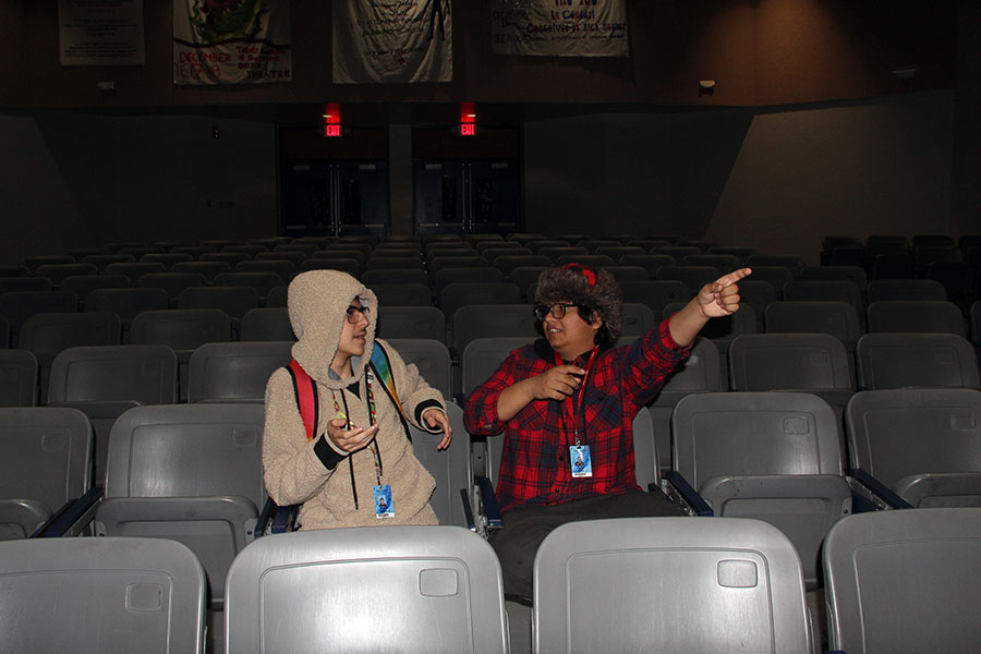 Freshmen Nathan Romero and Hugo Page share ghost stories in the theater. 