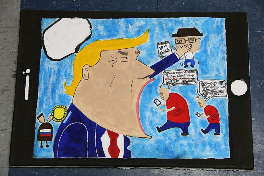 Painting of Donald Trump covering an editors words in a project titled Fake News, for World History teacher Christian Valadez .