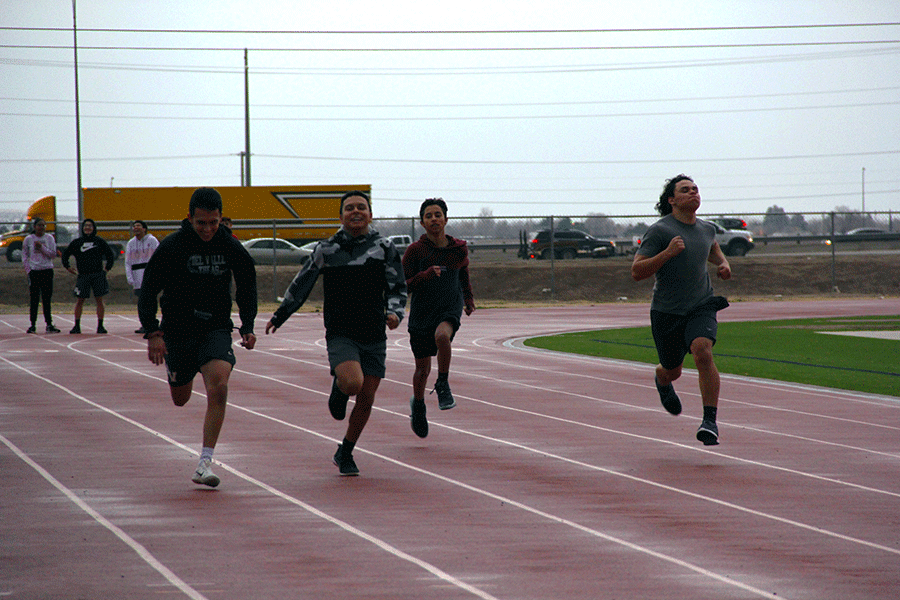 Track team members Jamie Ben Flores, Aiden Araizen, Justin Chavez, Luis Ponce for the February start.