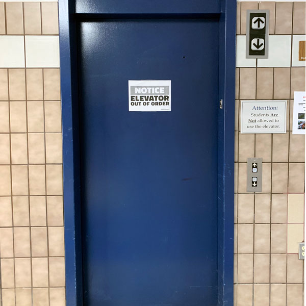 Decorated with an out-of-order sign, students were unable to use the elevator. 