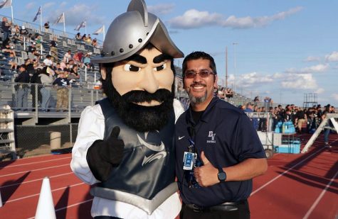 Principal Ivan Cedillo supporting the Conquistadores at the first home game, against Burges.